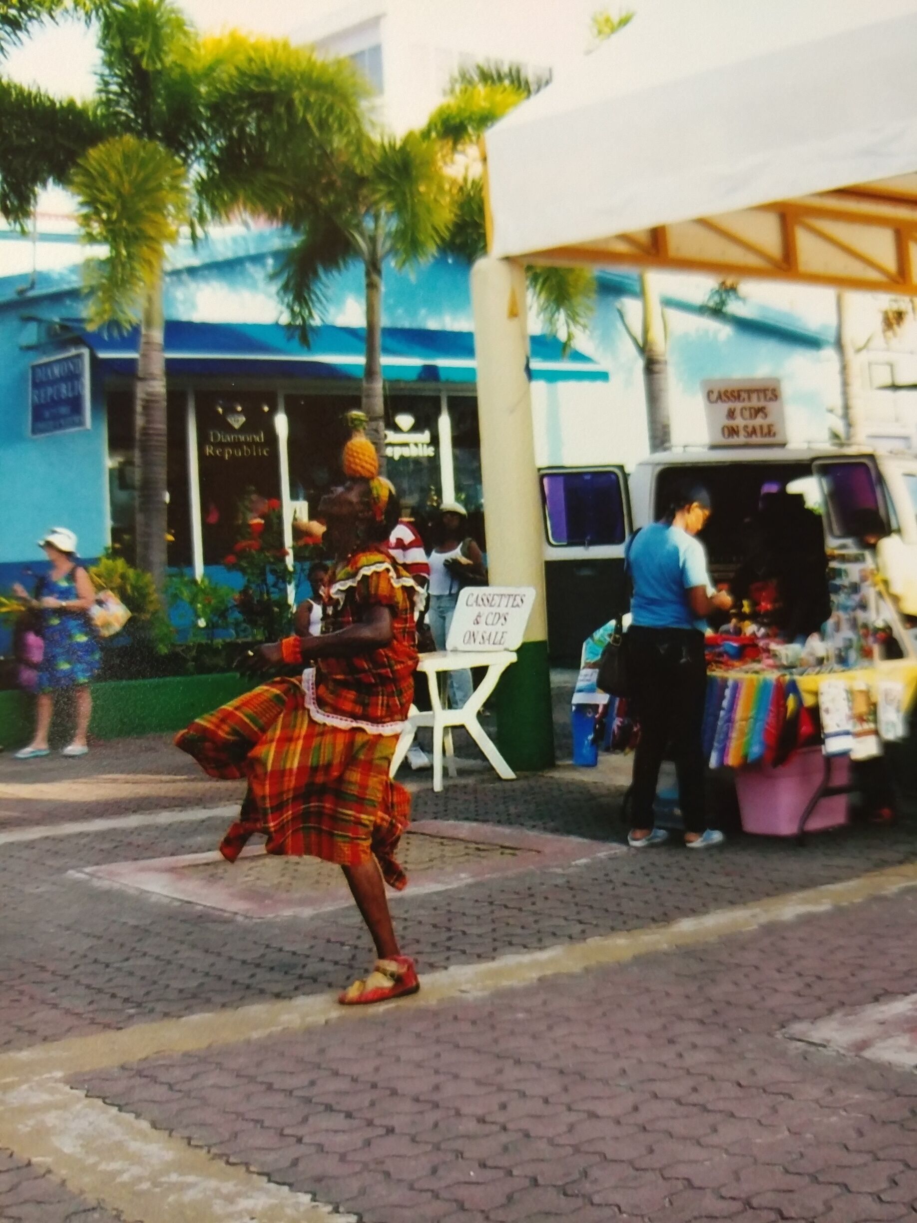 This woman was dancing while balancing a pineapple on her head in the downtown area of Antigua.  