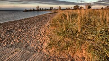 Beach Entrance Escanaba Michigan Sunrise; Shutterstock ID 87602932; purchase_order: SP-2650; Order: Michigan Spotlight Article + Listicle pages; client: Katerina Thomas