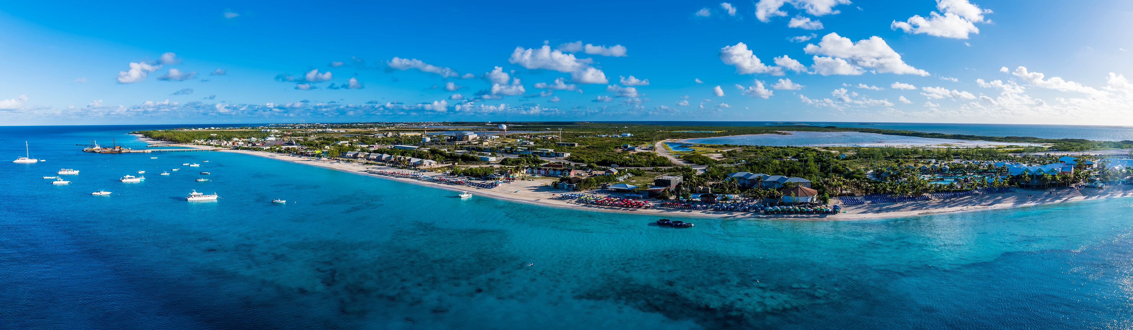 An aerial panorama view over the island of Grand Turk on a bright sunny morning