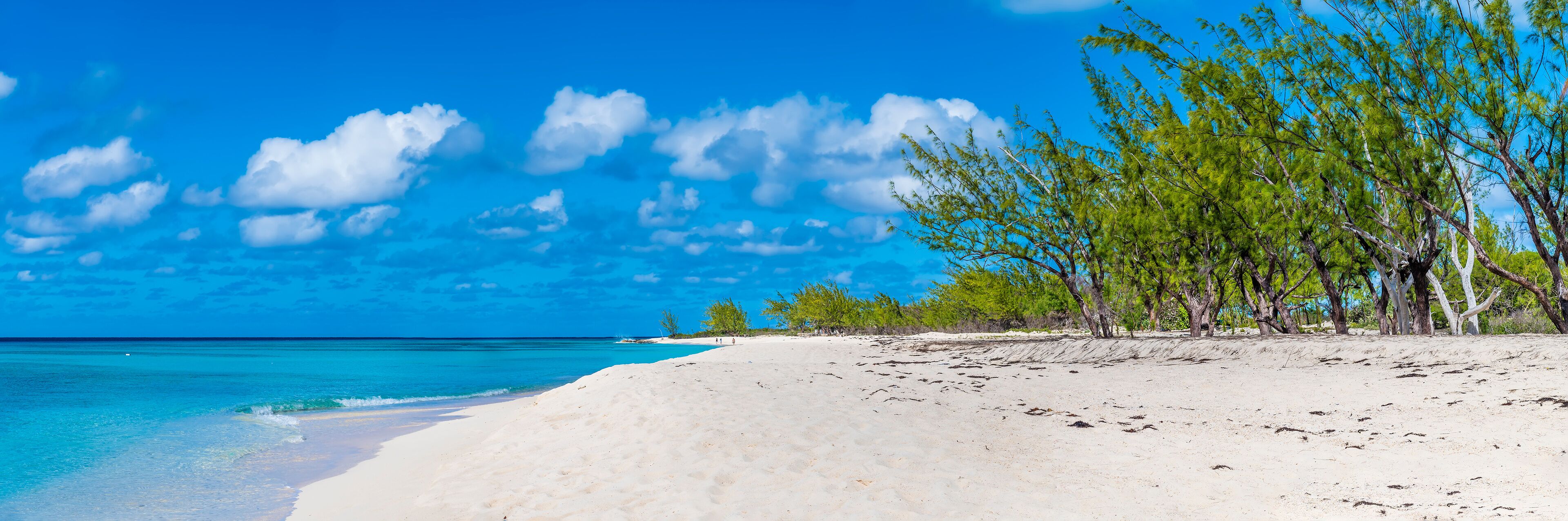 A panorama view along the deserted shore on the island of Grand Turk on a bright sunny morning