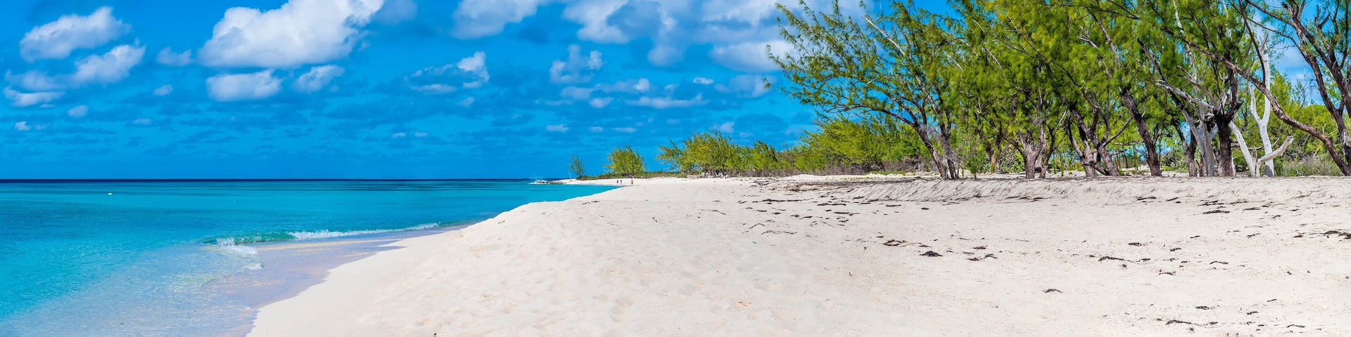 A panorama view along the deserted shore on the island of Grand Turk on a bright sunny morning