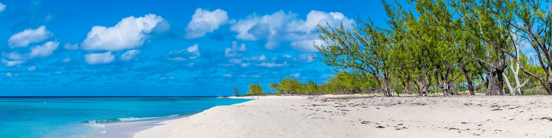 A panorama view along the deserted shore on the island of Grand Turk on a bright sunny morning