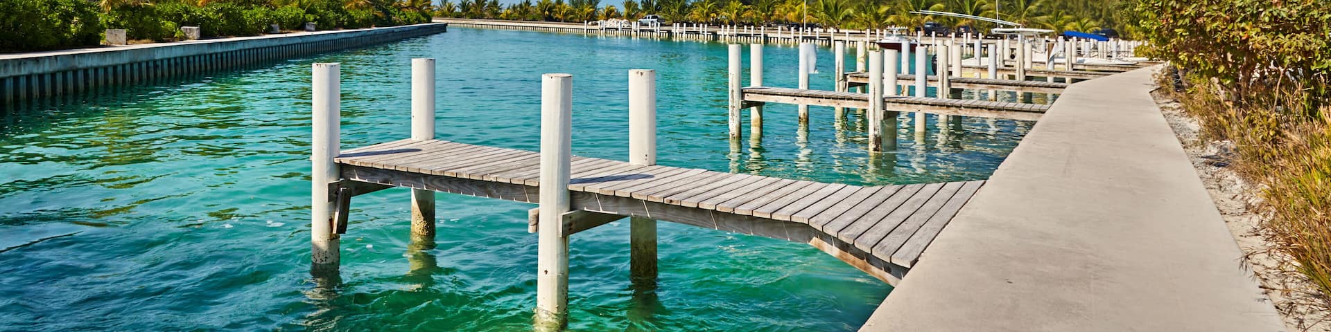 Docks line the harbor at Sandy Point, North Caicos, Turks and Caicos Islands