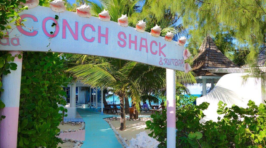 Conch Bar featuring a bar, tropical scenes and signage