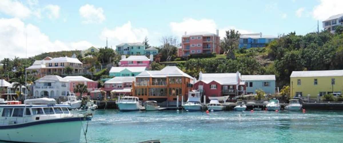 A harbor with colorful buildings and boats.