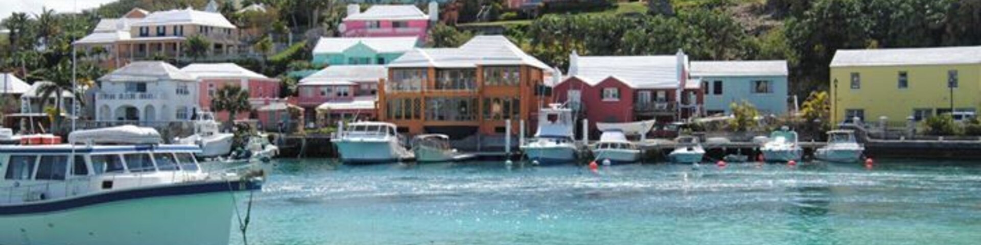 A harbor with colorful buildings and boats.