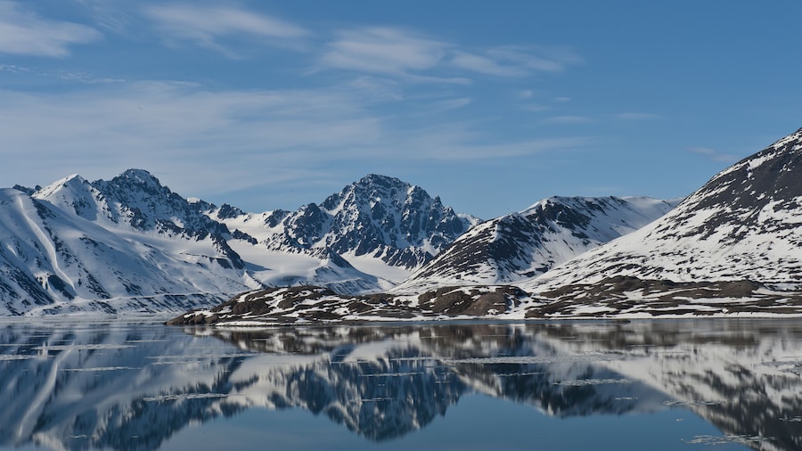 Reflections in water of Woodfjorden, Svalbard
