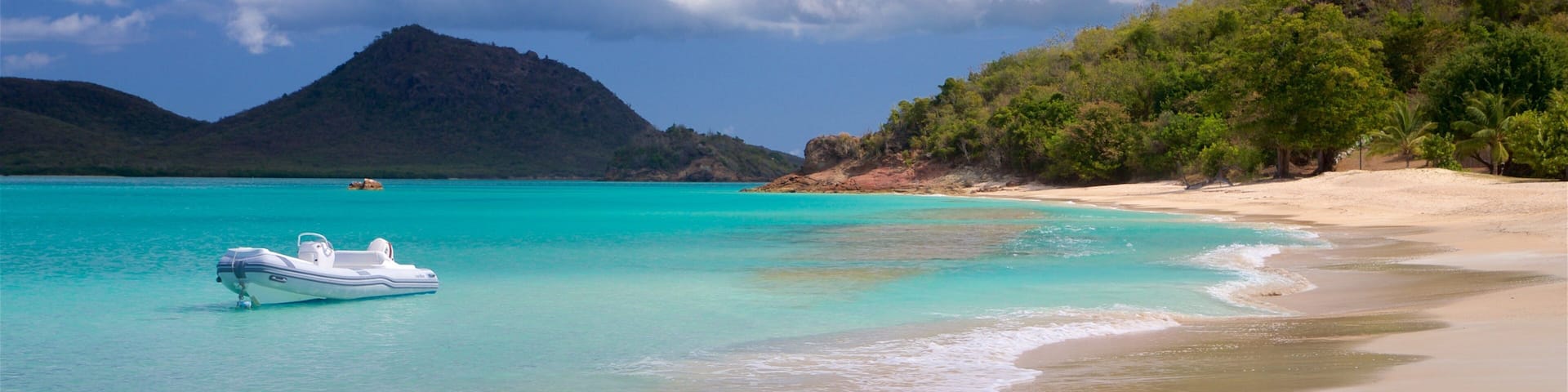 Antigua and Barbuda which includes general coastal views and a beach