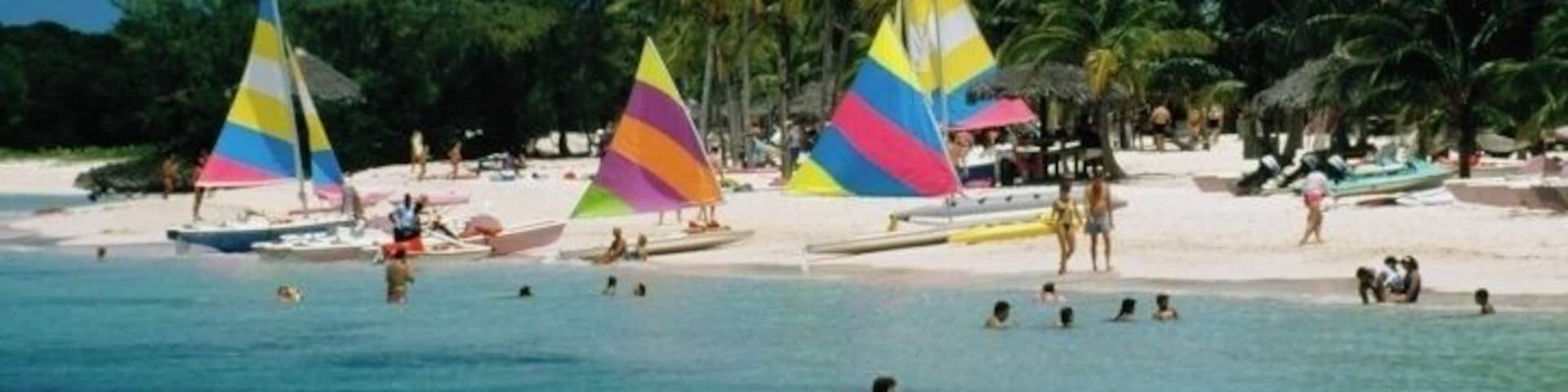 Colorful sails on a beach, Treasure Island, Abaco, Bahamas