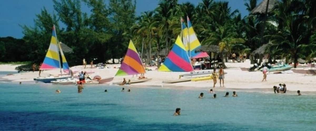 Colorful sails on a beach, Treasure Island, Abaco, Bahamas