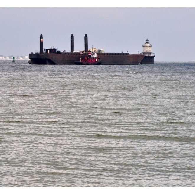 New Bedford Harbor: Dredge, tugboat and  Butler Flats Lighthouse.