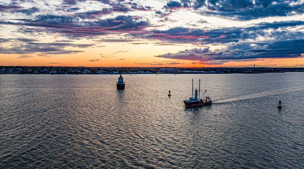fishing boat heading out to sea