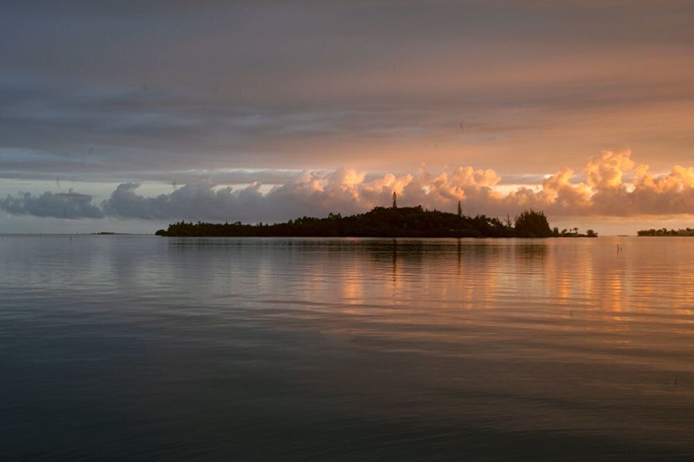Coconut Island,  on the Windward side of Oahu, HI. This is the view from my back yard at sunset. The opening credits for Gilligan's Island were shot here.