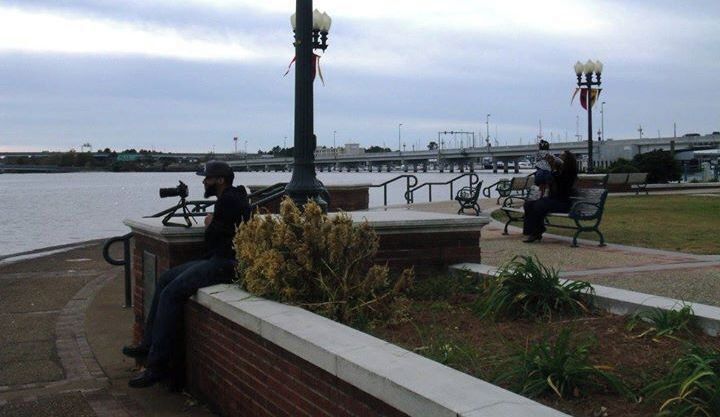 A fellow photographer and his family, waiting for the perfect shot.