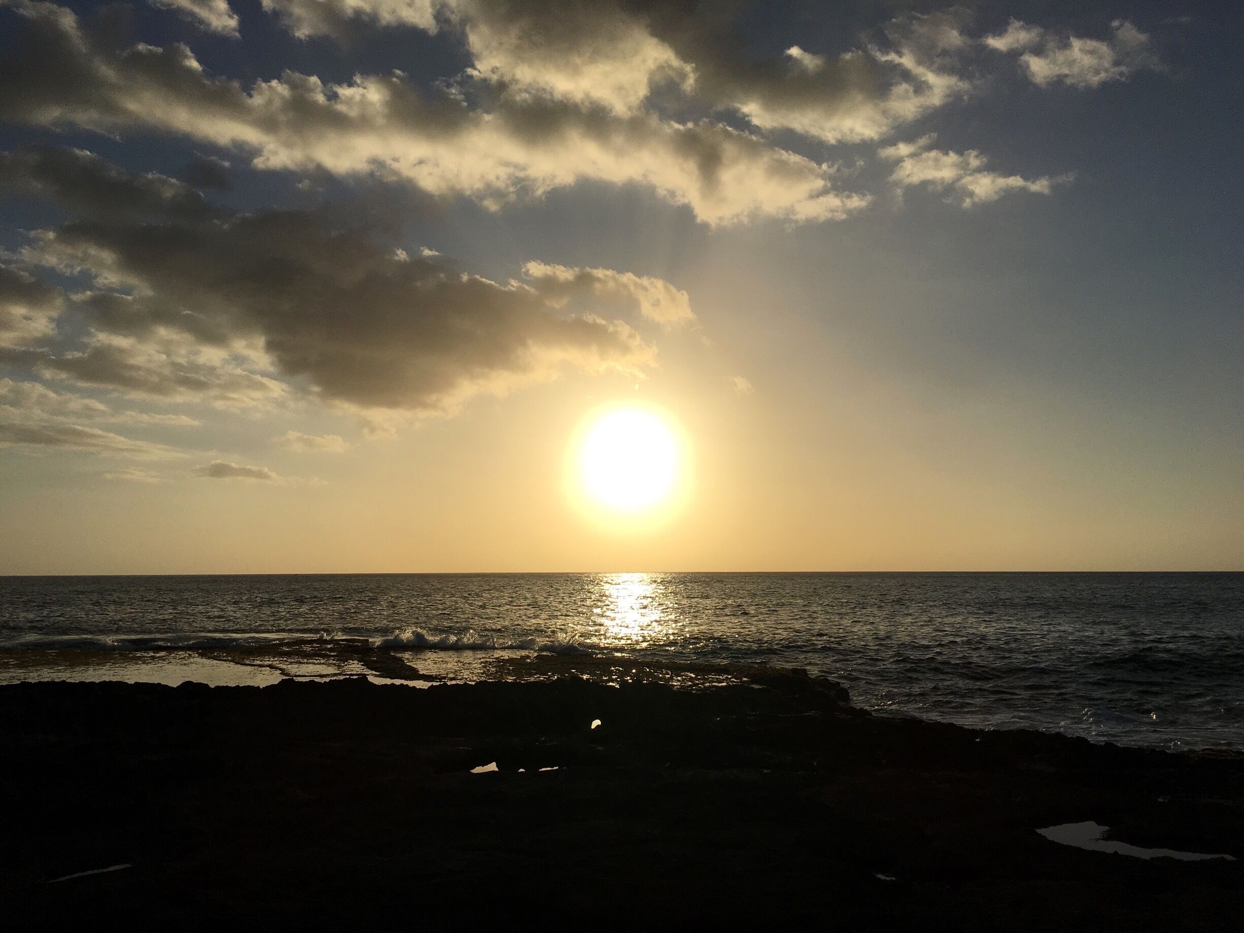 The beautiful Waianae /Makaha coastline on the Leeward side of Oahu . This stretch of vast beautiful depths of ocean so blue . I watch the Sunset here a lot . The warmth of The Sun , the sound of the ocean crashing . The mountains behind this are so green and jagged . Spectacular views all around you .
In Hawai’i the aina (land )is important and we must respect it 