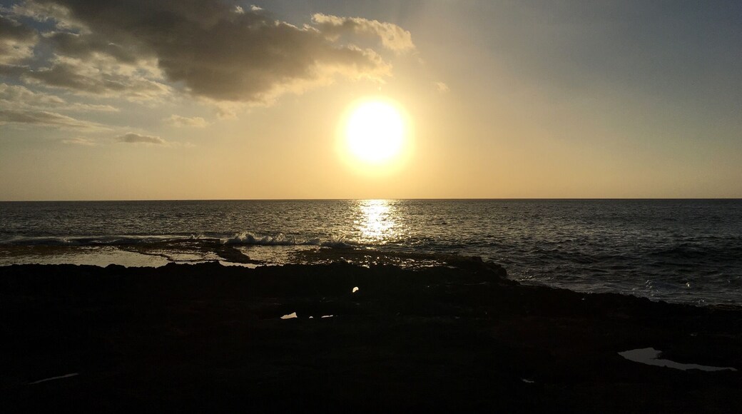 The beautiful Waianae /Makaha coastline on the Leeward side of Oahu . This stretch of vast beautiful depths of ocean so blue . I watch the Sunset here a lot . The warmth of The Sun , the sound of the ocean crashing . The mountains behind this are so green and jagged . Spectacular views all around you .
In Hawai’i the aina (land )is important and we must respect it