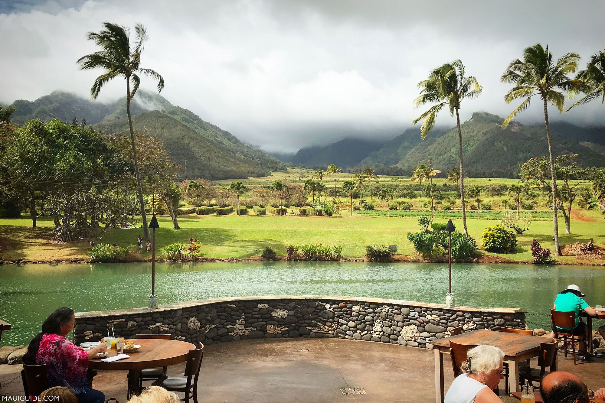 One of the many reasons Maui is considered a leading destination for photographers is due to the diversity it offers. No more than thirty-five minutes from Wailea rests The Mill House in Waikapu Valley—an award-winning restaurant tucked onto the grounds of the Maui Tropical Plantation. A restaurant? you might say—and to which we’d reply, this is no ordinary venue. Situated next to a duck pond and peering out upon verdant crops, part of The Mill House’s aim is to preserve Maui’s past—particularly in terms of the role that plantations played. To that end, its horseshoe bar is bookended by locomotives from the 19th century, while pieces of Maui’s last sugarcane mills—from fly wheels to photographs—welcome diners to its grounds. But it’s The Mill House’s view of the vertiginous West Maui Mountains that renders it oh-so-photogenic. 
https://www.millhousemaui.com