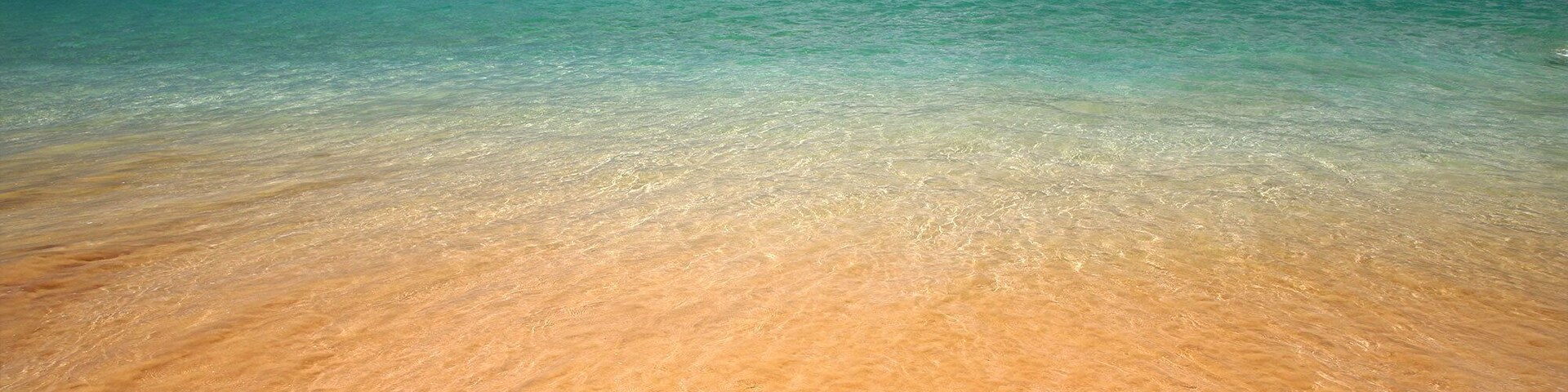 Makena State Beach Park received its moniker of Big Beach for good cause: Spreading across 3,000 feet of white sand, it goes down as one of the largest continuous beaches in the Hawaiian Islands—a feature that renders photographs stunning in scope (and that’s not even accounting for the red cinder dome, Pu’u O’lai, that comprises its northern edge, its impossibly-blue waters, or its unsullied views of the outlying islands). Some of the best shots are found in pairing its ragged-but-beautiful kiawe trees with slices of the water, which reaches impressive heights—and creates one of the gnarliest shore breaks around—during summer. Equally advisable? Hiking to the overlook provided by Pu’u O’lai, which allows for a sweeping shot of Big Beach on one side, and a few steps further, pics of the turquoise sea offered by its counterpart, Little Beach.
http://www.mauiinformationguide.com/makena.php