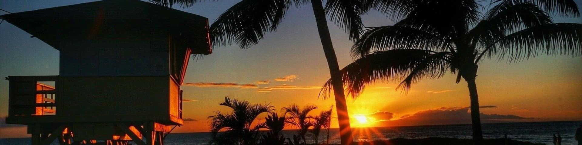 Sunstars and life guard shack across the street from the Aston