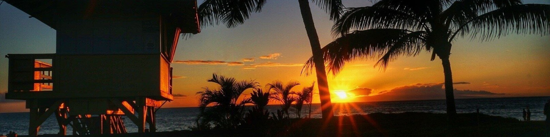 Sunstars and life guard shack across the street from the Aston