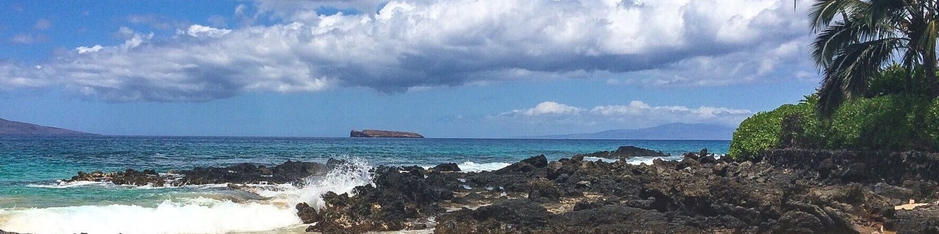 This beach is known as Secret Beach, but it isn't much of a secret.  However, it's a beautiful spot tucked away behind a small opening in a rock wall and totally worth seeking out.  A lot of couples choose to get married here at sunset, hence its other nickname of Wedding Beach.