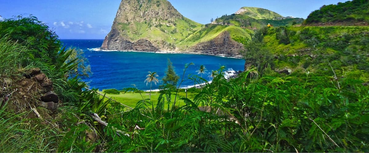 Located on the North coast of Maui, this quiet valley and village is a little difficult to get to. It is along a 18 mile one lane road that hugs the sea cliffs. The 18 miles took about 2 hours to drive, with many times finding oneself having to back up to let others by. The village also has a stand that is reported to have the best banana bread in the World.