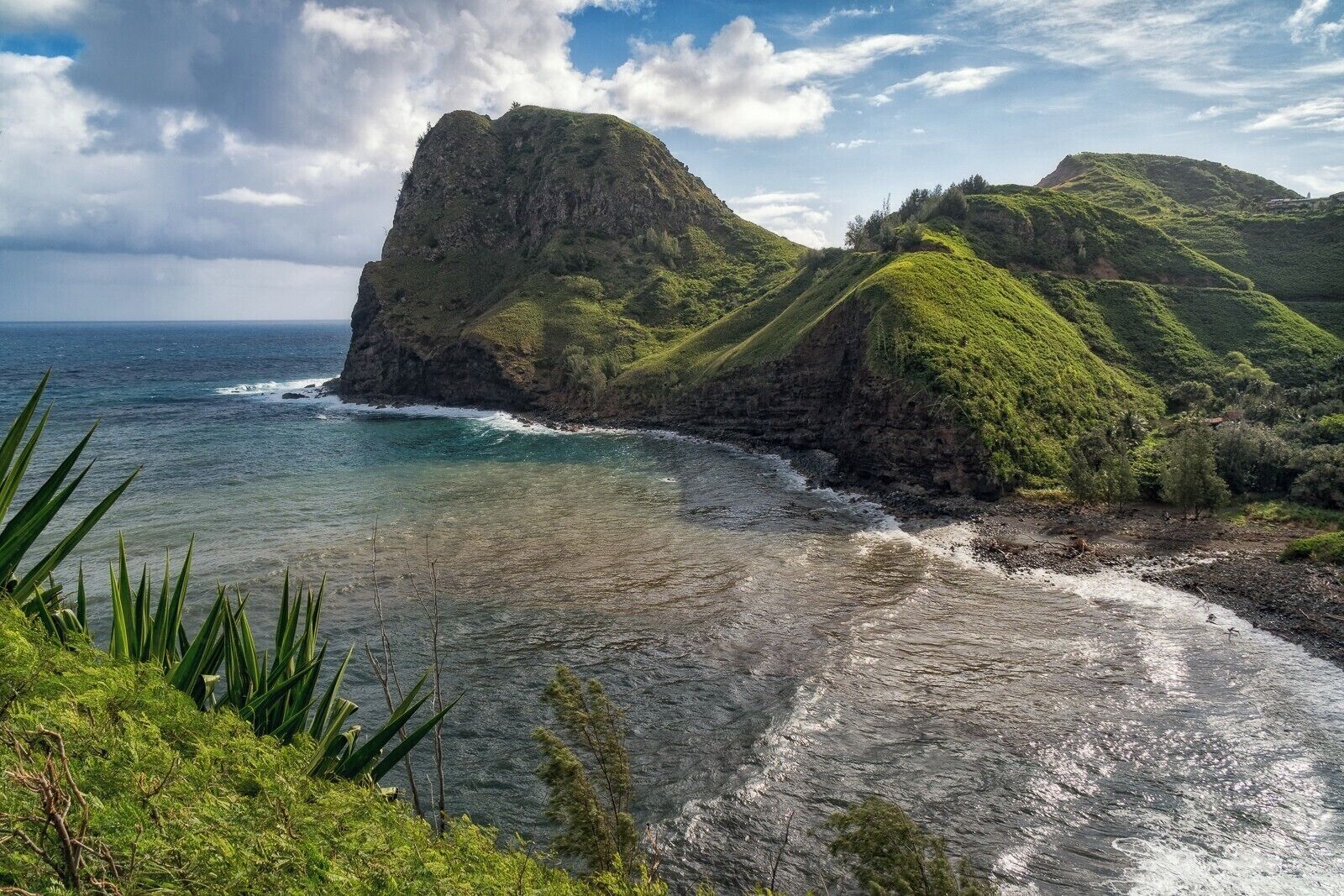 If I can give you one tip about visiting Maui, it would be forget the Road to Hana. Drive west up Maui's north shore on the Road to Kahakuloa for twice the danger, ten times better scenery, and one percent of the crowds.