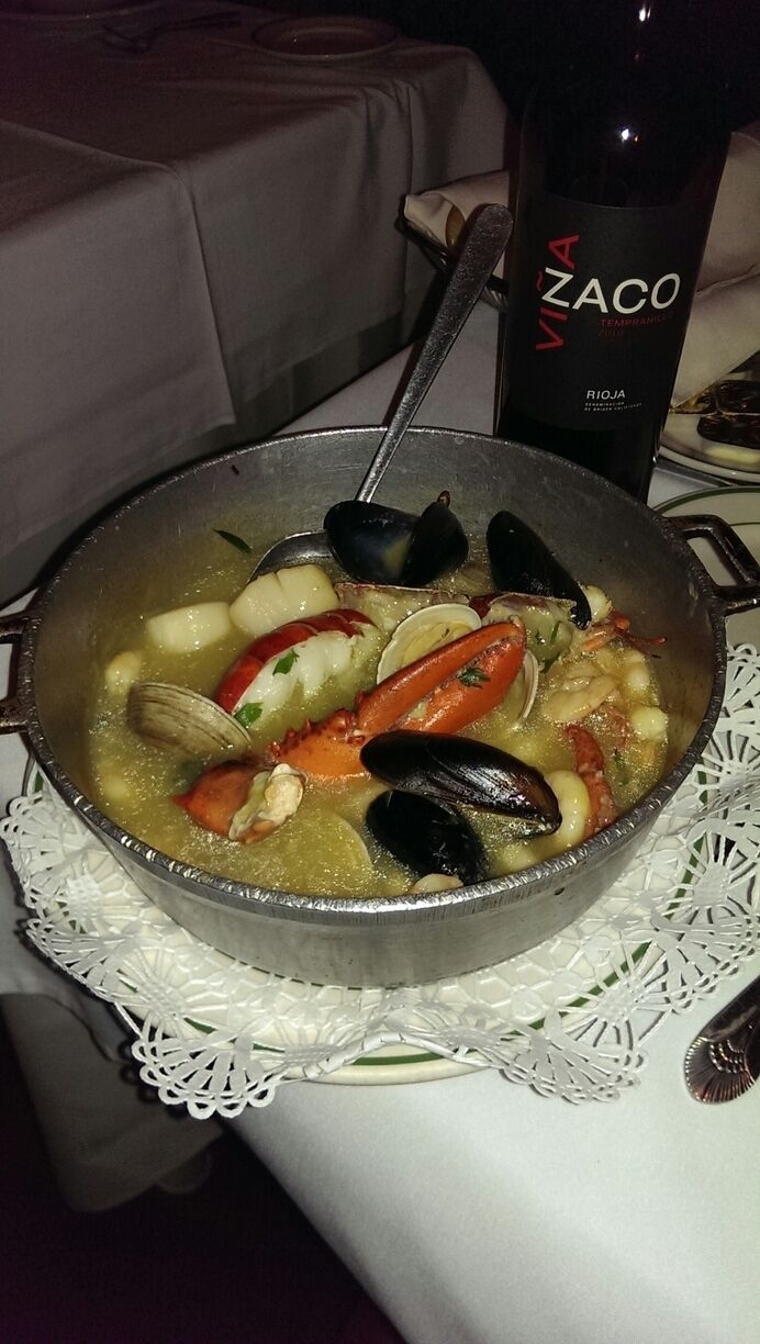 Mariscada...lobster, mussels, clams, scallops and more in a garlicky broth. 