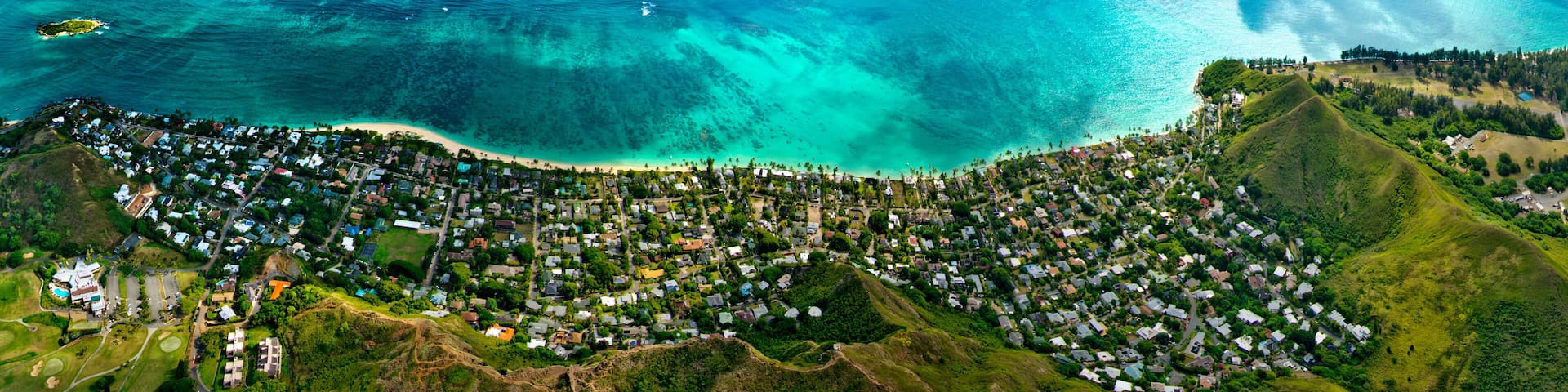 Aerial view of Lanikai Beach with houses along coastline