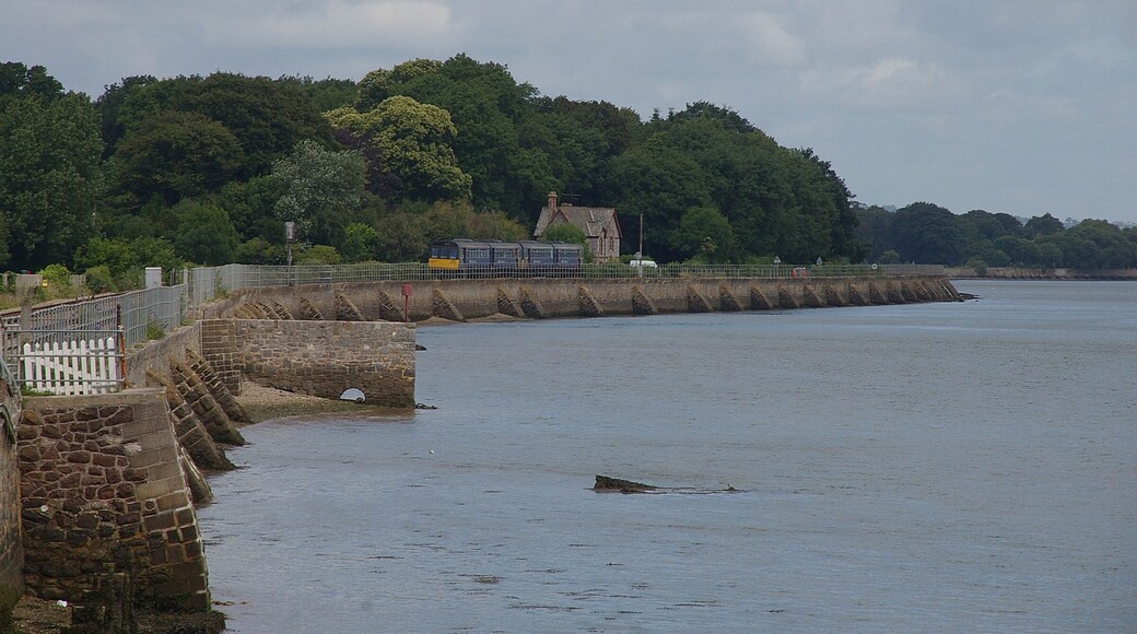 First Great Western 142029/142063 heads north away from Starcross railway station, bound for Exmouth.
