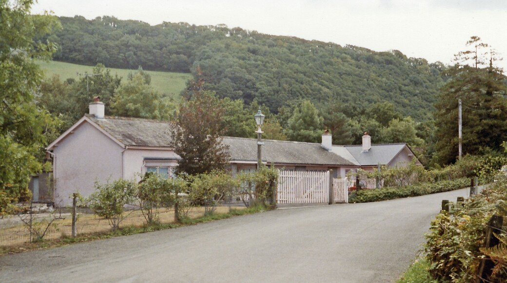 Former station at Christow, 1984. View SE in the Teign Valley, towards Heathfield: Exeter - Heathfield (- Newton Abbot) line. Yet another station converted to a private house, Christow station had been closed from 9/6/58 along with the line from Exeter. However, goods traffic continued from the Heathfield end until later severe flood damage eventually led to closure from 1/5/61 as far as Trusham although the last section to Heathfield remained in use until 1/7/68.
