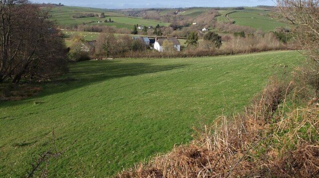 Venn Farm A beautiful old thatched farmhouse on the slopes above the Teign valley. Seen from the lane between Bridford and Bridfordmills. "Probably early C16 origins, remodelled in the late C16/early C17, roof raised late C18. Whitewashed rendered cob and stone rubble; thatched roof, half-hipped at left end, gabled at right end; end stacks and axial stack, all with brick stafts; right gable end weatherboarded." http://www.imagesofengland.org.uk/Details/Default.aspx?id=85578&mode=adv . http://www.mit.edu/~dfm/genealogy/sercombe.html mentions that in 1901 a Joseph Sercombe lived here "with his wife Mary, their children Wilfred, Charlie, Bessie, Polly, Joseph, William, David, John, Percy, and Ruth, and carter Frank SERCOMBE (his fourth cousin)".
