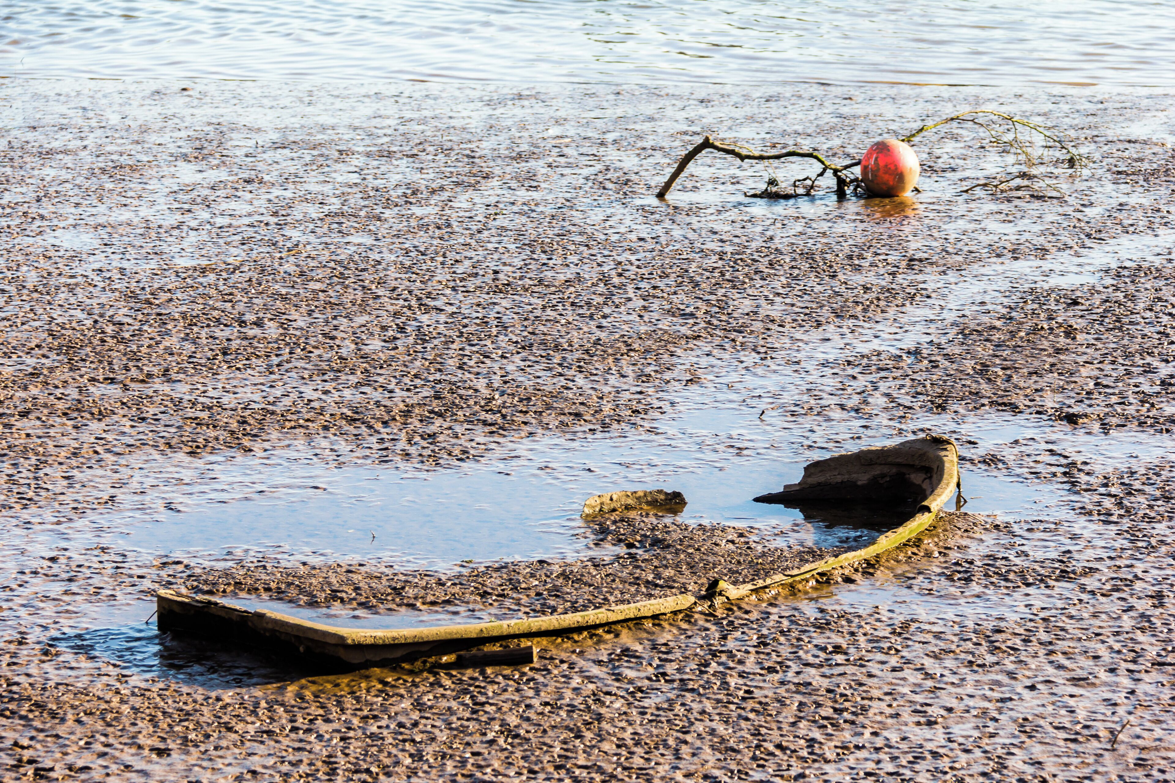 Rowboat, shipwreck in the mudflats of river Exe at Topsham, Devon