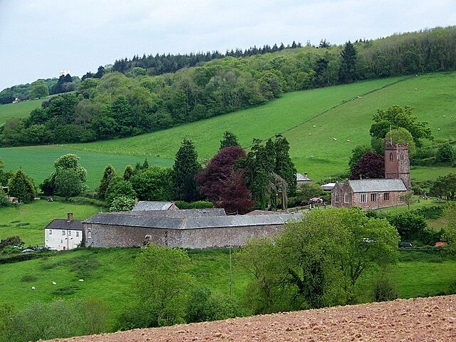 View of Dunchideock Dunchideock is Celtic and means 'the wooded fort or camp,' possibly referring to the earthwork of Cotley Castle which is nearby. The church is a late 14th century building, restored in 1875-7 and 1889, when the chancel was rebuilt.