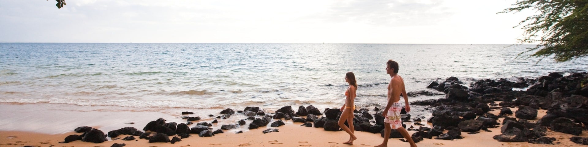 Kawaihae which includes a beach and rocky coastline as well as a couple