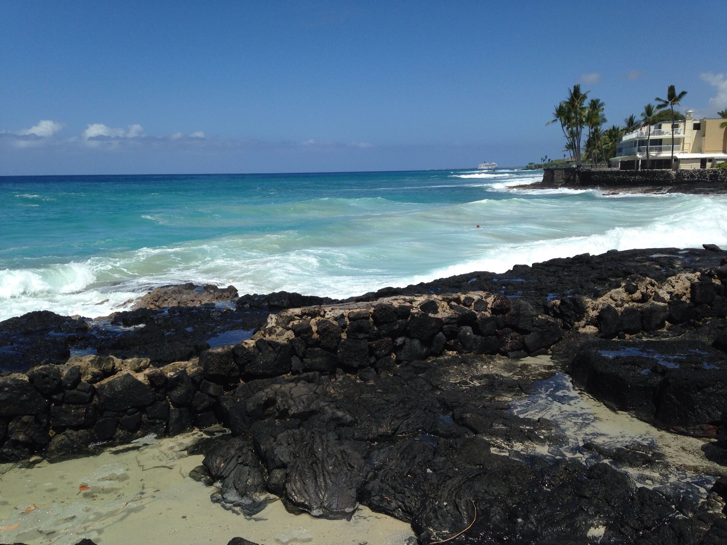 Driving along the Kona coast and stopping at several of the sandy beaches. There is a surf advisory of 7 to 10 foot waves this morning, a surfers delight.