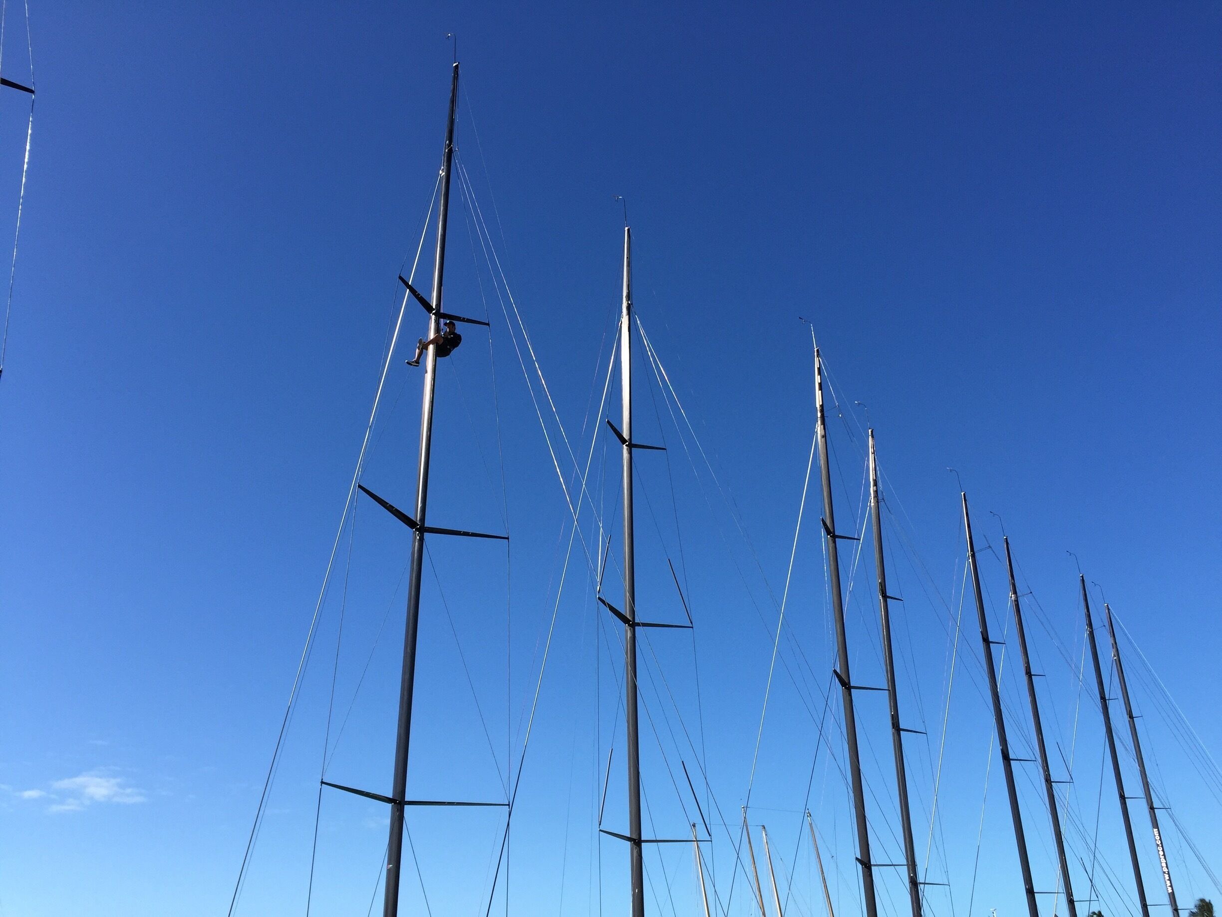 Up on the top of the mast of a Super G racing yacht. These racing boats are filling the harbor in Key West as they prepare to race next week. It is fascinating watching them prepare for the event. 