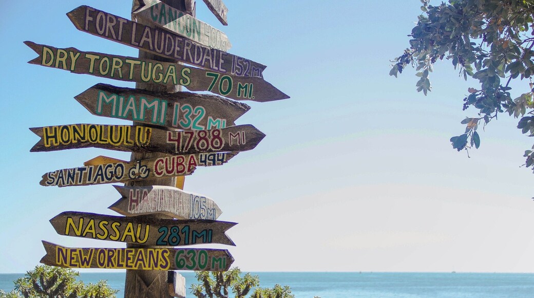 Really cool sign that show how far away you are from different places. One of the most beautiful beaches I've ever been to. #BVStrove