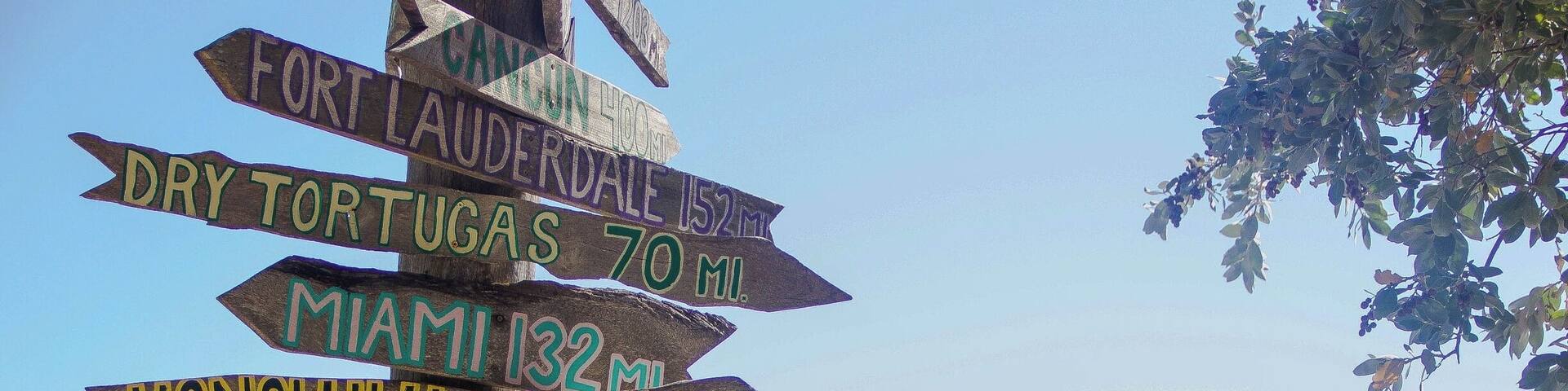 Really cool sign that show how far away you are from different places. One of the most beautiful beaches I've ever been to. #BVStrove