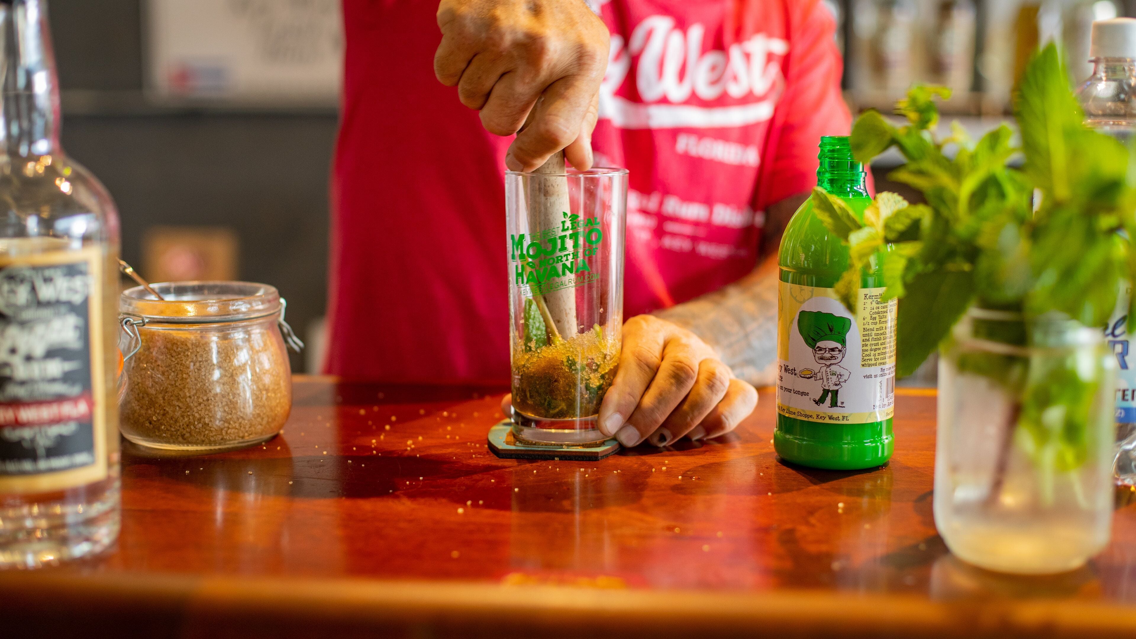 Key West which includes a bar and drinks or beverages