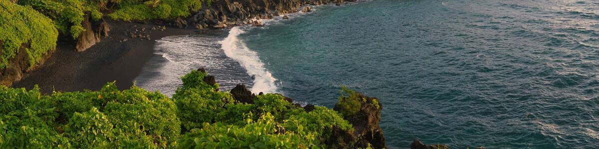 hawaiin beach with volcanic sand