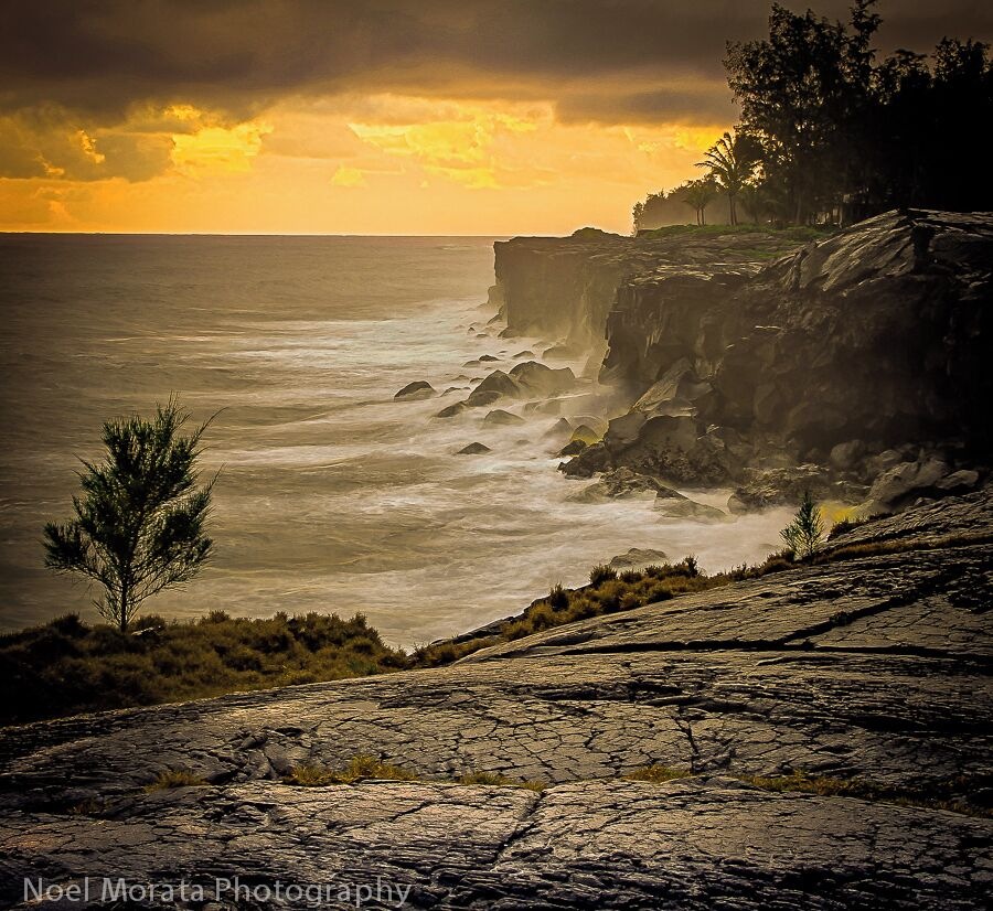 Sunrise on Hawaii Island and first light starts to break on the irregular lava patterns that end abruptly on cliffs in East Hawaii. Yes, sunrises are worth waking up for in Hawaii. Here are more sunrises across the island for you to enjoy
http://travelphotodiscovery.com/sunrise-in-hawaii-travel-photo-mondays-28/
#goldenhour