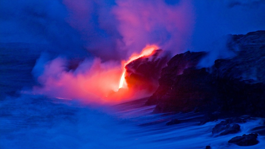 Pahoa showing rugged coastline, night scenes and mist or fog