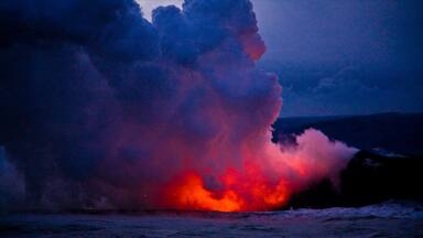 Pahoa which includes general coastal views, night scenes and mist or fog