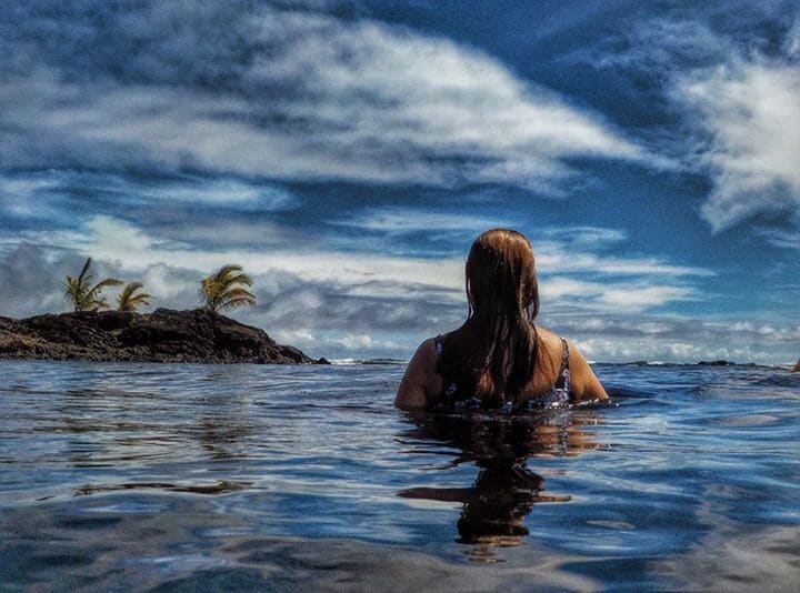 Champagne Ponds....
South of Pahoa.  
Take 130, left on 132 to the end of pavement, then right on 137.  First road to the left that says, "Private road, residents only"
Park across from the mail boxes and walk through gate.  Stay on Kapoho Beach rd.  You will find the beach access.....

Warm fresh water meeting the ocean keeps the ponds a wonderful temp....
