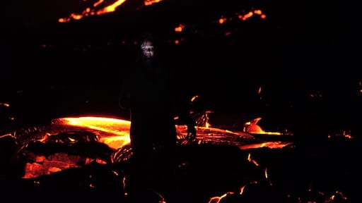 My wife Jennifer standing in front of a lava flow with a flashlight on her face. i have to say this was a heated moment. A slip would have been fatal so I was a nervous wreck. Thankfully she has great balance and coordination.