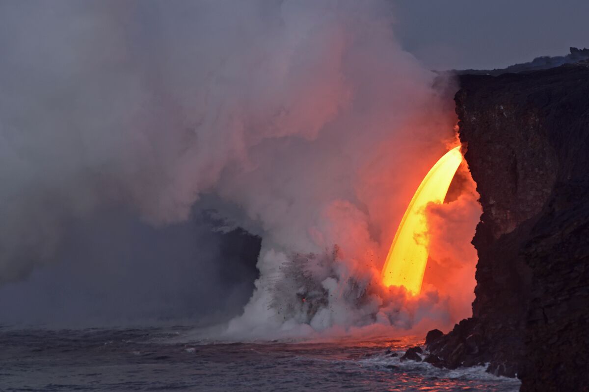 Early in the morning just after the sun had come up. Lava is very hard to expose correctly in total darkness. We timed our trip around the moon cycles so we could photograph the stars and lava together but  during our stay in Volcano it was cloudy every day. In spite of that it was an amazing experience.