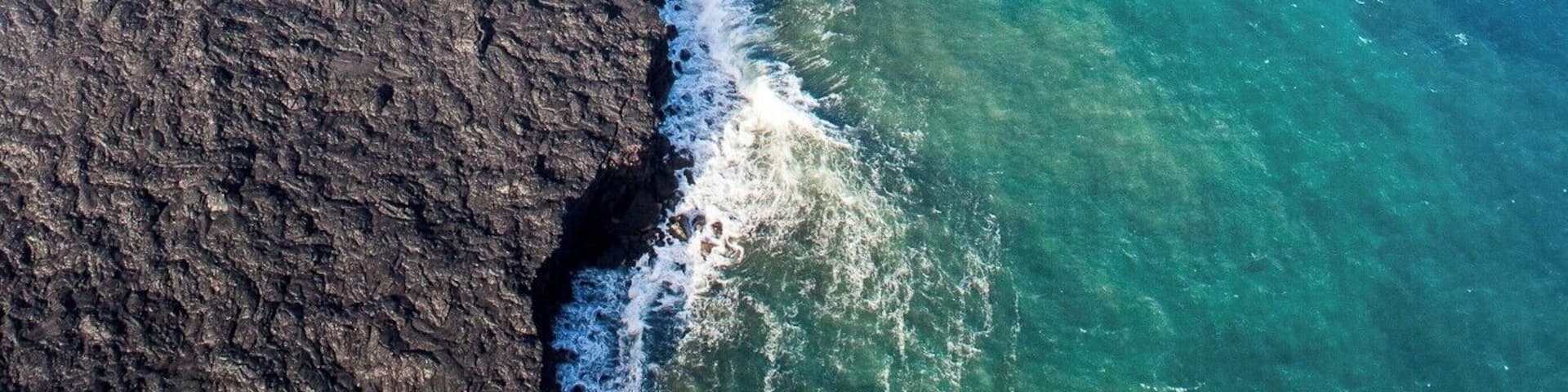 A door's off helicopter tour from Hawaii's Big Island gave me a unique perspective of the lava flow as it was just flowing into the ocean. Here you can see a little bit of the flowing lava, which is what I had wanted to see. However, what I found even more interesting, even after getting a better angle on the red lava, was seeing the hardened lava which had overtaken the road at certain points. I particularly loved the dramatic contrast between the devastated earth and the beautiful blue water, full of so much life.
#BVSBlue