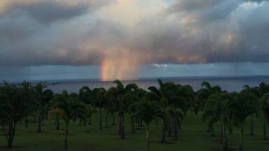 An iridescent rain cloud spotted just off the Hamakua coastline. Hawaiians had special words for this special occurrence, like "kahili" which means part of a rainbow which stands straight up.