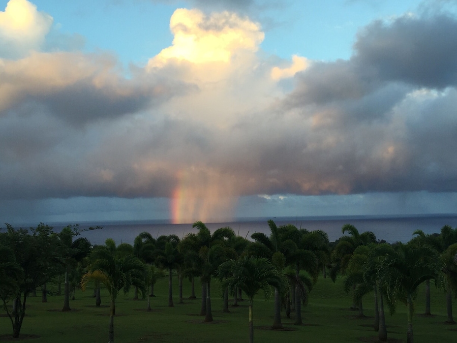 An iridescent rain cloud spotted just off the Hamakua coastline. Hawaiians had special words for this special occurrence, like "kahili" which means part of a rainbow which stands straight up.